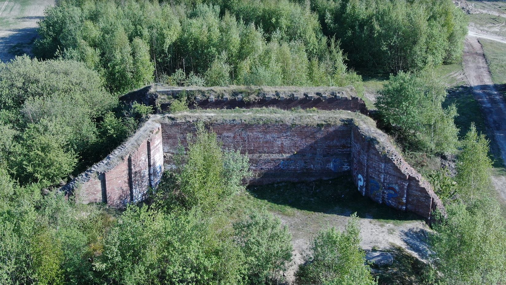 Derelict railway bridge near Walton Country Park